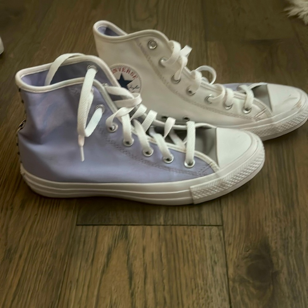 Womens size 8 US. Customized Converse high tops. Barley ever worn.